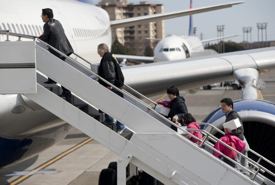 passengers boarding the aircraft