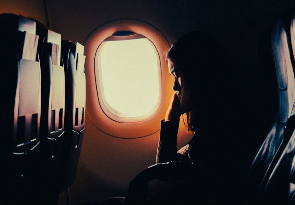 Woman Sleeping in an Aircraft